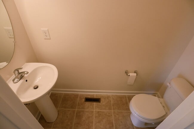 Building Photo - Spacious 4BR Home with Garage Steps from C...