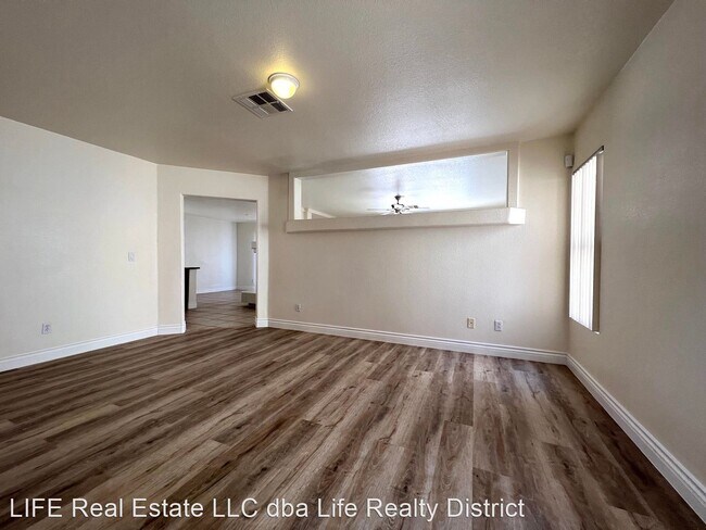 Building Photo - 4 br, 2.5 bath House - 5865 Enchanted Palm...