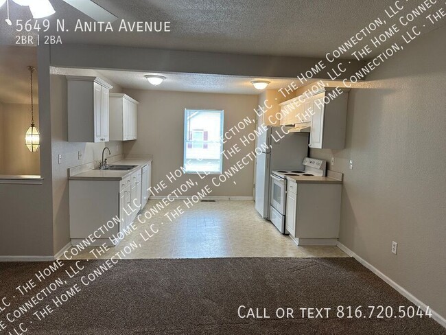 Building Photo - 5649 N Anita Ave