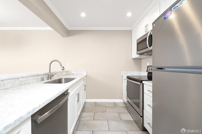 Building Photo - "Charming 1-Bed, 1-Bath Condo at 13700 San...