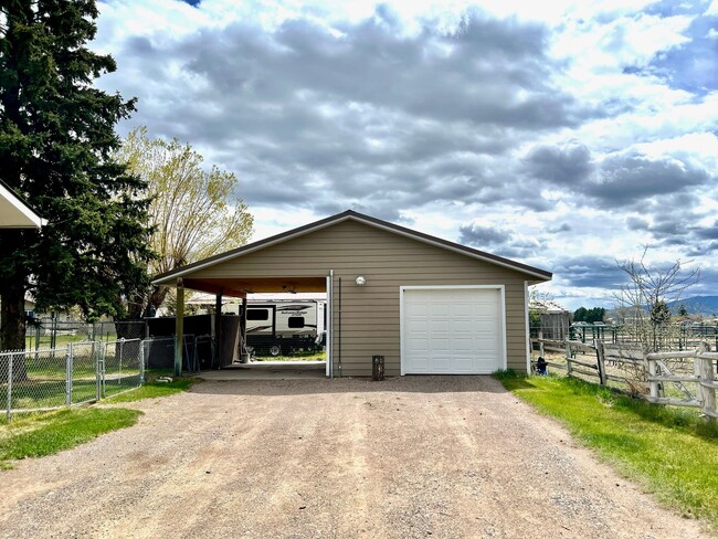 Building Photo - Pet Friendly 2 Bed 2 Bath Single Family Home With Garage, Private Deck and Big Yard!