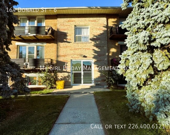 Photo du bâtiment - Cozy 1 Bedroom Apartment