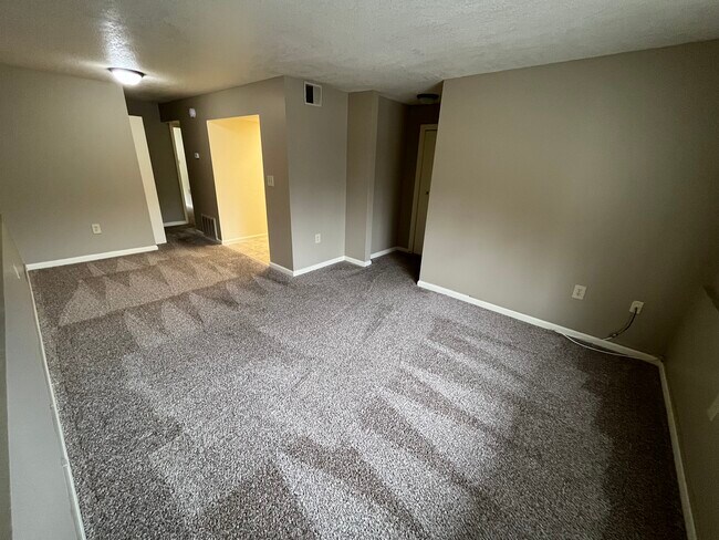Sala de estar/comedor - Eagle Landing Apartment Homes
