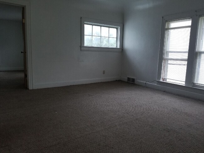 Building Photo - 1243 W Mullan Ave