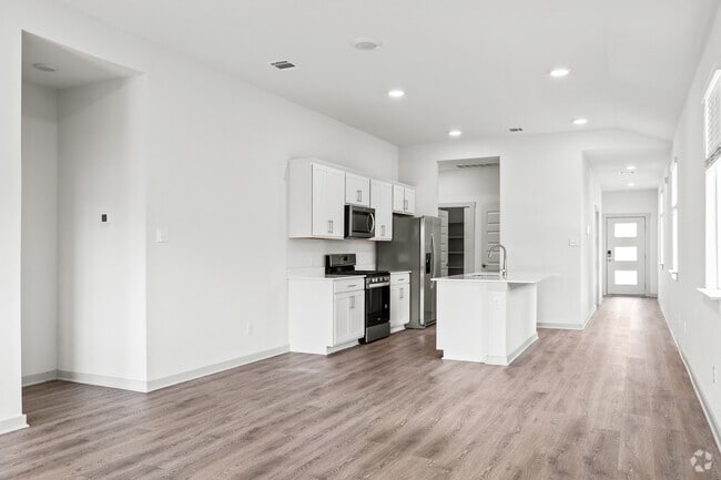 3 habitaciones, 2 baños - 1489 pies cuadrados - Sala de estar - Millbrook Commons