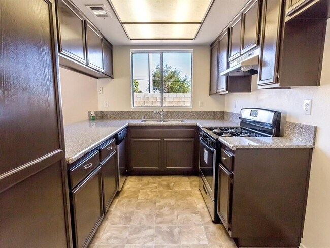 Building Photo - 38755 Desert Flower Dr