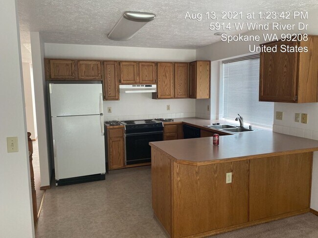 Foto del edificio - 5912 W Wind River Dr