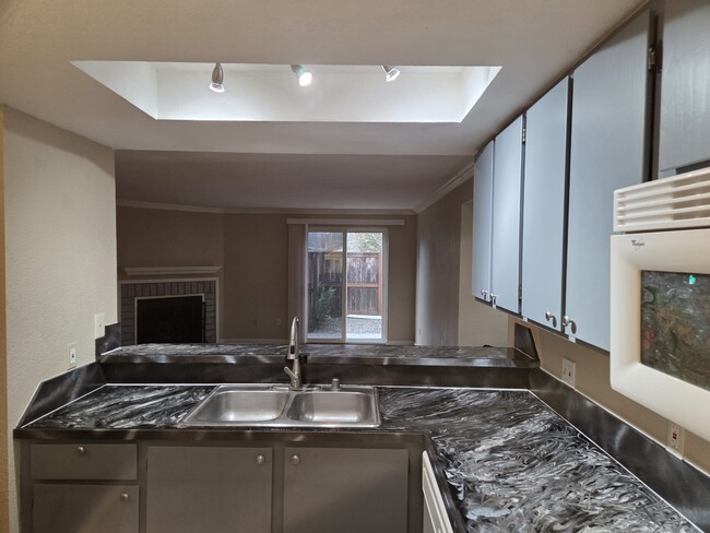 Open floor plan and serving counter - 220 Israel Rd SW