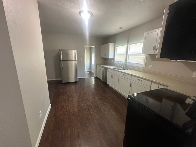Building Photo - Spacious 4-Bedroom Home Near Northtown Mall