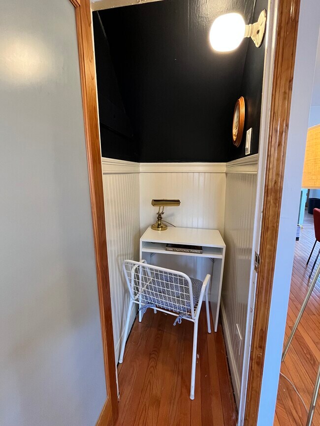 Dedicated Work Space equipped with 4 outlets, 2 lighting options, and privacy door. - 1214 Moore St