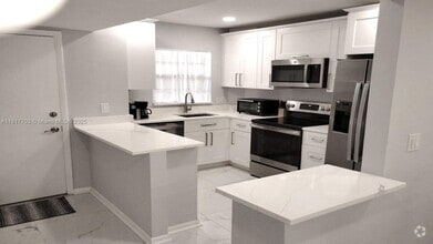 Building Photo - 200 Jacaranda Country Club Dr