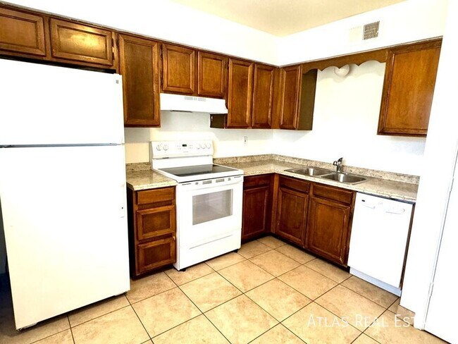 Building Photo - 111 N Phyllis-202