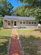 Building Photo - 5821 Robinhood Dr