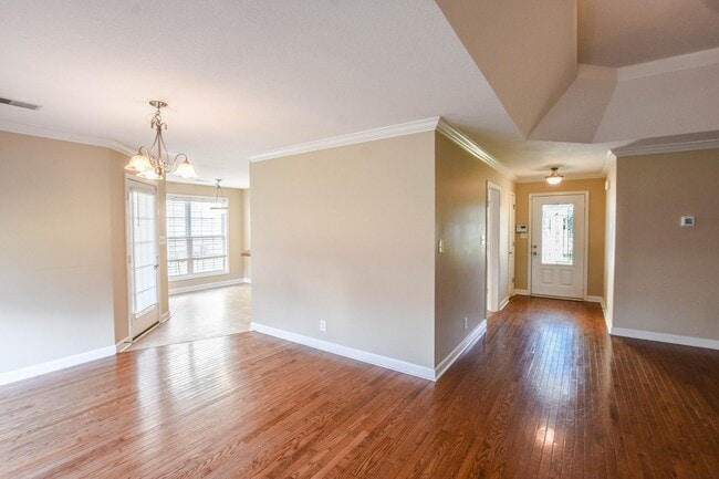 Building Photo - Pet Friendly Three Bedroom with Bonus!