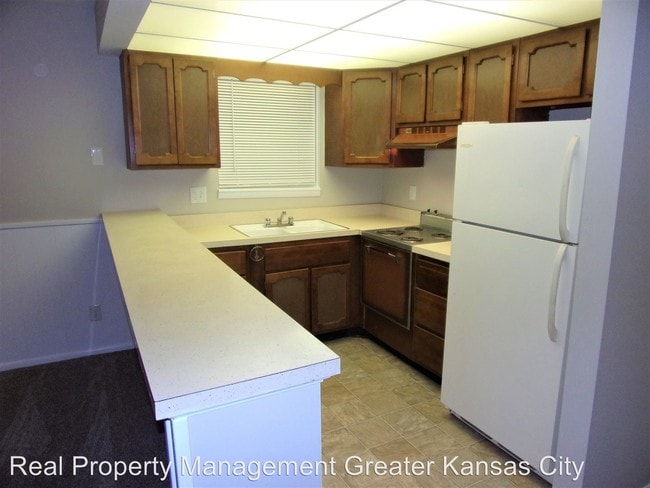 Building Photo - 1 br, 1 bath House - 8000 E. 88th Ter Apt 2