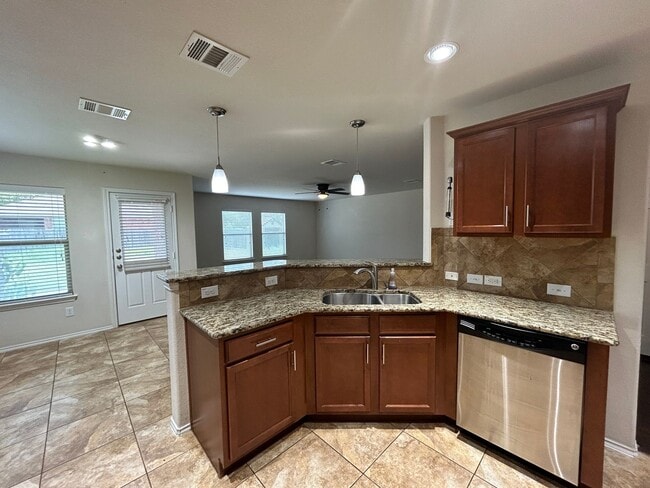 Building Photo - Sunlit Sanctuary: Spacious 4-Bedroom Home ...