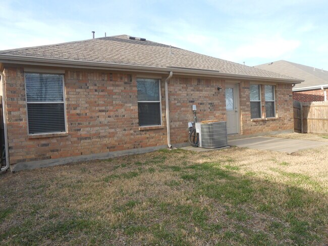 The back of the house. - 6928 Prairie Dawn Ln