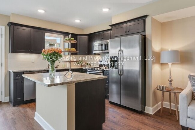 Building Photo - Designer Kitchen with Finished Basement - ...