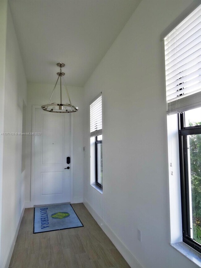 Building Photo - 9691 W 35 Ct