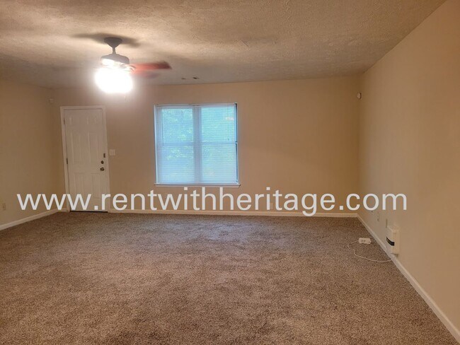 Building Photo - WOW!!!.....AWESOME BRICK TOWNHOME ( CORNER...