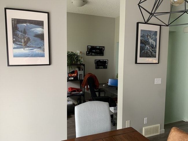 Main Floor Den - 404 Copperpond Row SE