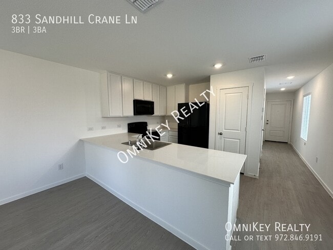Foto del edificio - 833 Sandhill Crane Ln