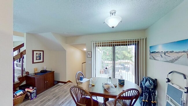 Building Photo - 2 BR, 1.5 BA Clive split level duplex.  Deck and one car attached garage.
