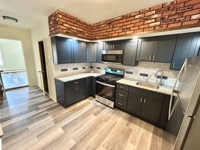 Building Photo - 108 W Girard Ave