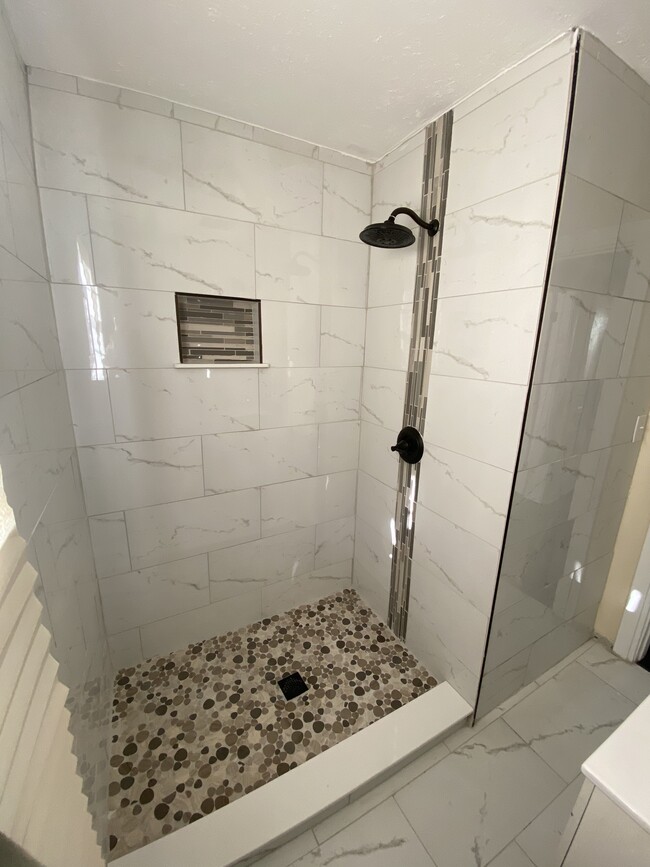 Newly tiled shower - 1303 Hamilton St