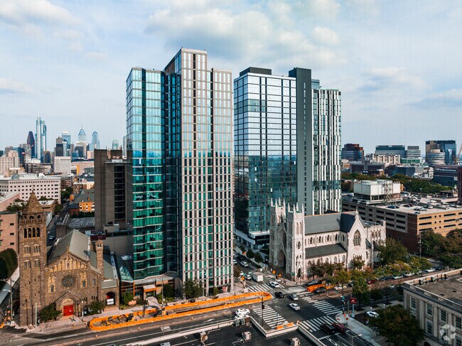 Modern buildings fill the streets of the Spruce Hill neighborhood in Philadelphia.