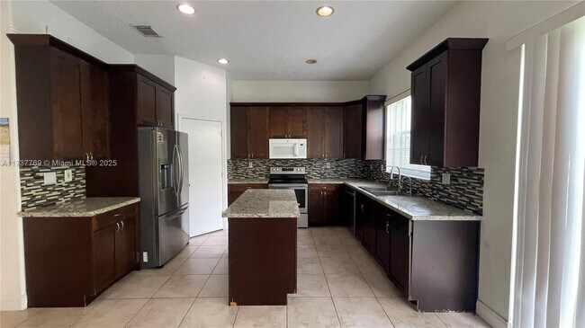 Building Photo - 7743 NW 21st Dr