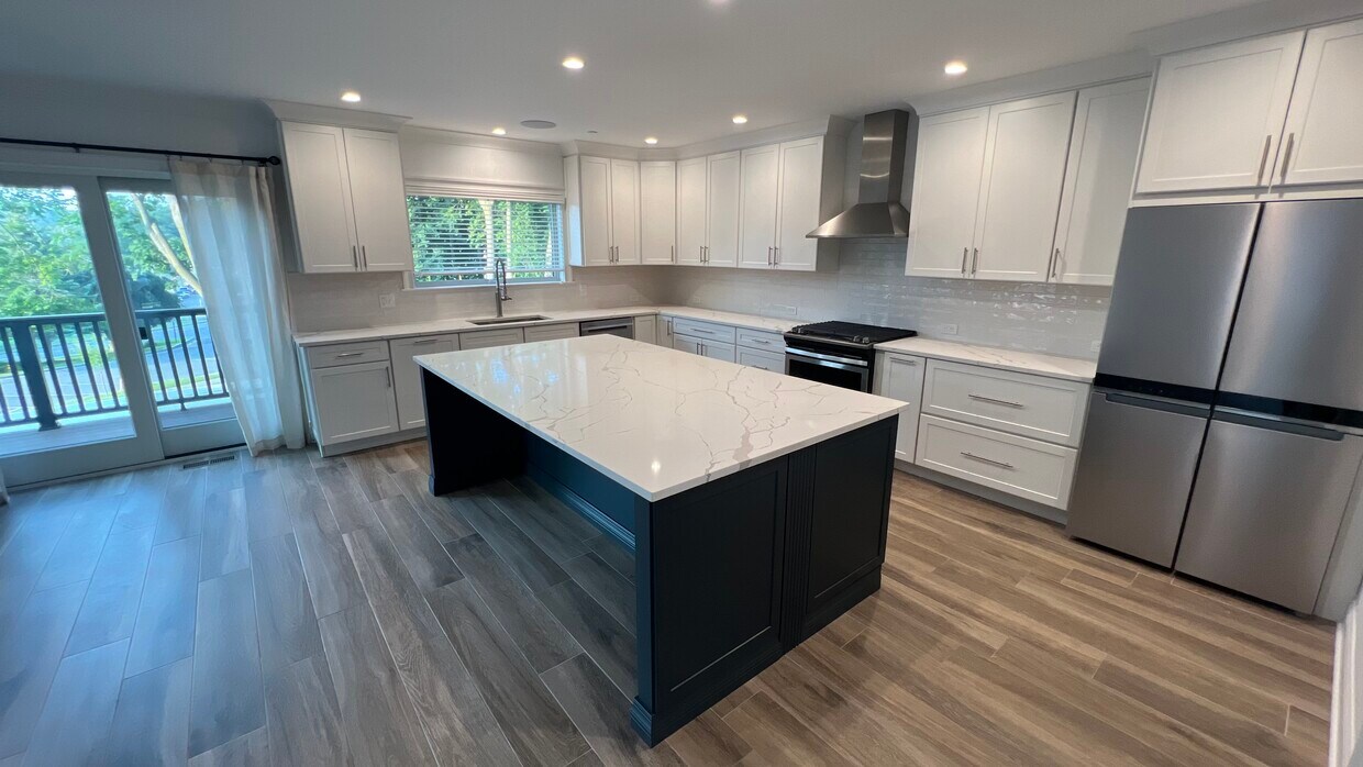 Bright Modern Kitchen connects to deck - 4 Madison St