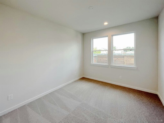 1 of 2 secondary bedrooms on the 1st floor. - 717 N Emile St