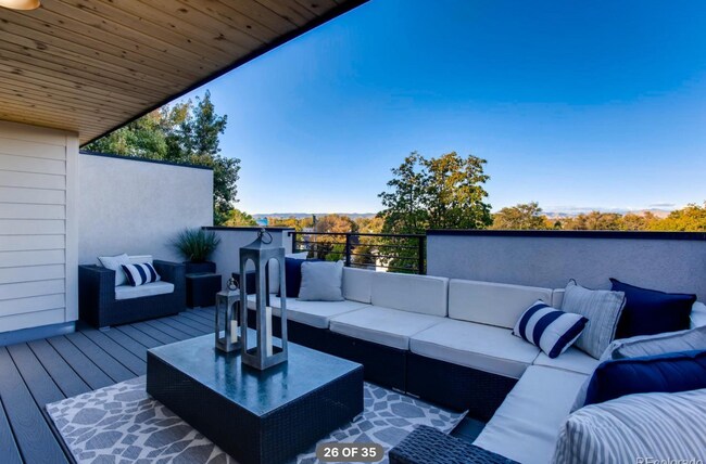 large rooftop with mountain views now features a gas firepit (installed after this photo) - 2765 S Sherman St Townhome