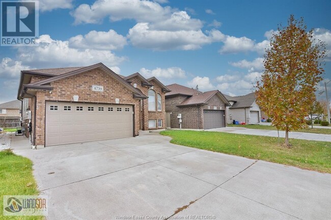 Building Photo - 4759 Periwinkle Crescent