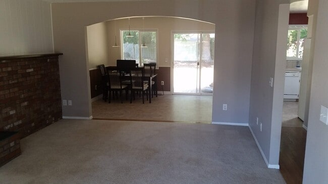 Dining room viewed from living room. - 4061 NE Brogden St