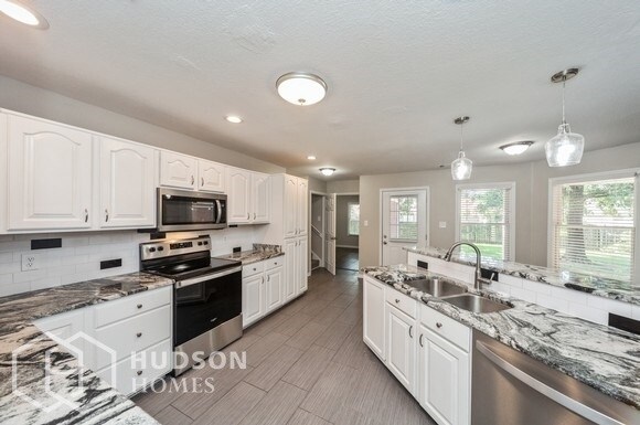 Building Photo - NOW AVAILABLE! - 7019 Sassy Tree Ln, Milli...