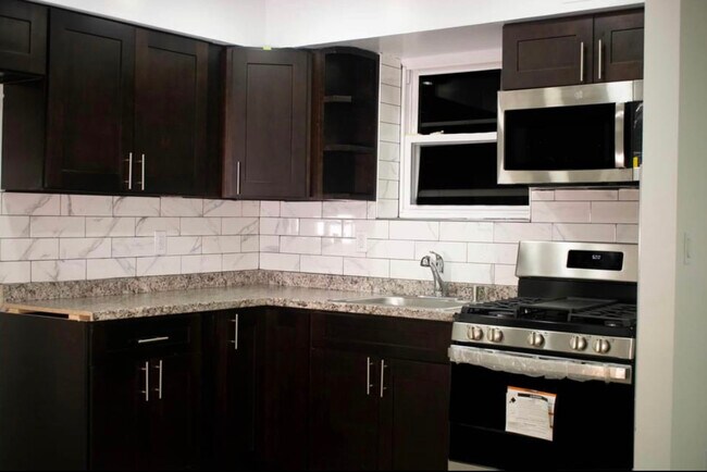 Kitchen is located to the left side of the entrance. - 13440 161st St