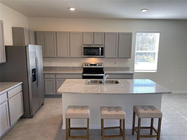 Building Photo - 9011 Milestone Dr