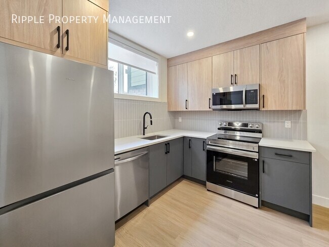 Photo du bâtiment - BRAND NEW 2 BEDS, 1 BATH LOWER SUITE | SCANDI-DESIGN LIVING IN BOWNESS