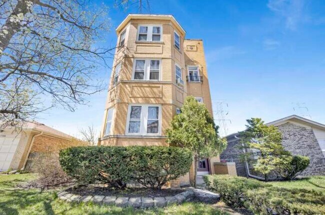 Foto del edificio - 7746 Tripp Ave
