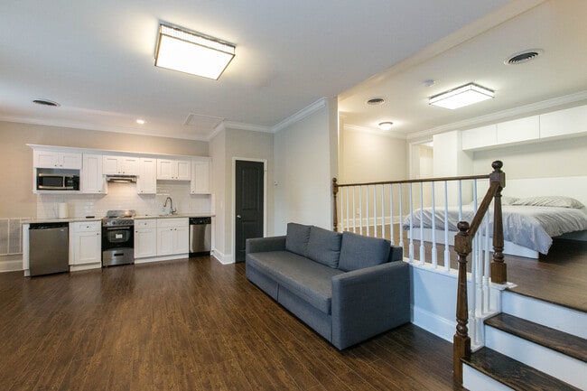 Full Kitchen With Sofa bed - The Residence at 1743 N Decatur Apartments