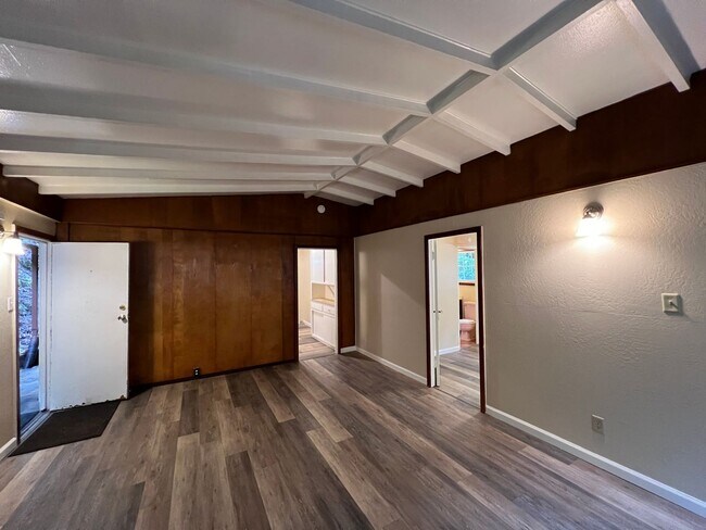 Building Photo - Two Bedroom hilltop home with Carport, lar...