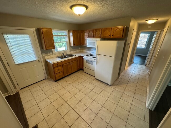 Kitchen tile floors - 307 Pleasant Dr