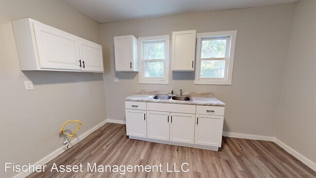 Building Photo - 2 br, 1 bath Apartment - 3150 W 40th Stree...