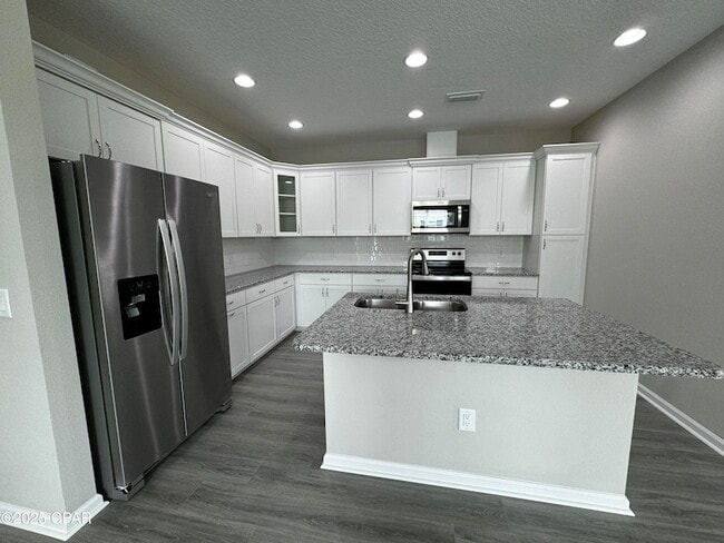 Building Photo - 9022 Parrot Pl