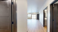 Located at 2090 Carlson Dr in North Mankato, MN, this well-designed 2-bedroom, 2-bathroom unit offers a thoughtful single-floor layout with modern finishes throughout. The open-concept living and kitchen area is anchored by light wood-look flooring, recessed lighting, and large windows that invite abundant natural light. Sliding glass doors lead to a private balcony, offering pleasant outdoor views of the surrounding neighborhood. The kitchen is a standout feature, equipped with white shaker cabinetry, white quartz countertops, stainless steel appliances including a range, microwave, dishwasher, and refrigerator, plus a central island with pendant lighting — ideal for both cooking and casual dining. Both bathrooms continue the clean aesthetic, with wood-look flooring, white fixtures, dark-framed doors, and one featuring a walk-in shower while the other offers a full tub-shower combo. The two bedrooms are carpeted for comfort, each receiving natural light through sizable windows. A dedicated laundry room houses a full-size washer and dryer alongside a water heater, adding everyday convenience. Two closets provide ample storage. The overall ambiance is bright, clean, and contemporary, making this a highly functional and comfortable living space.