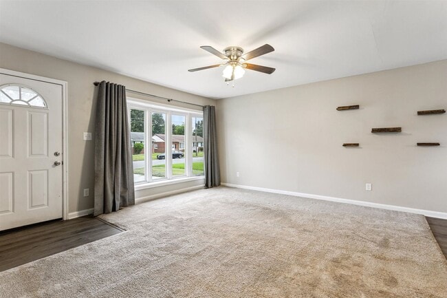 Building Photo - Charming brick rancher with modern kitchen...