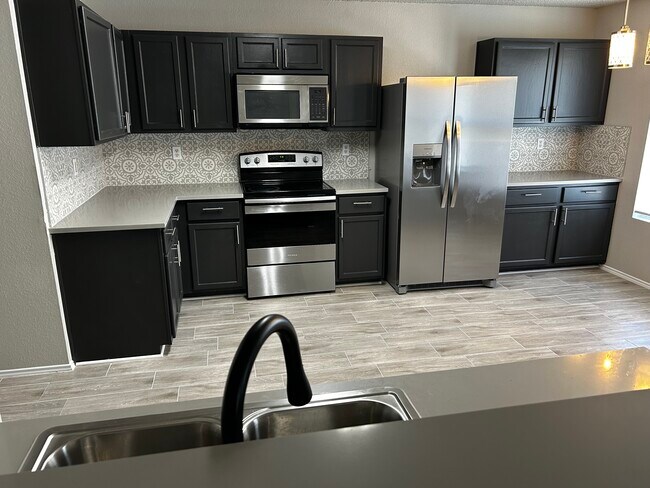 Foto del edificio - 8720 Hunters Creek Dr