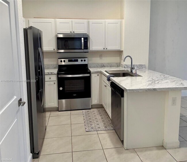 Foto del edificio - 3 br, 2.5 bath House - 1100 SW 6th Ct